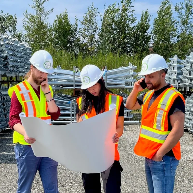 3 engineers who's looking at a plan