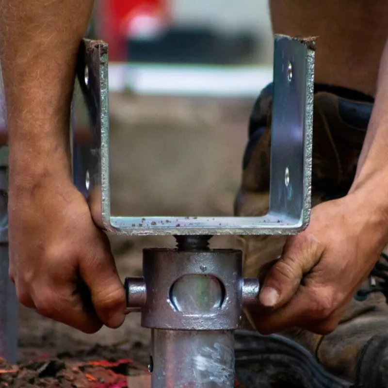 Person who drill a screw piles